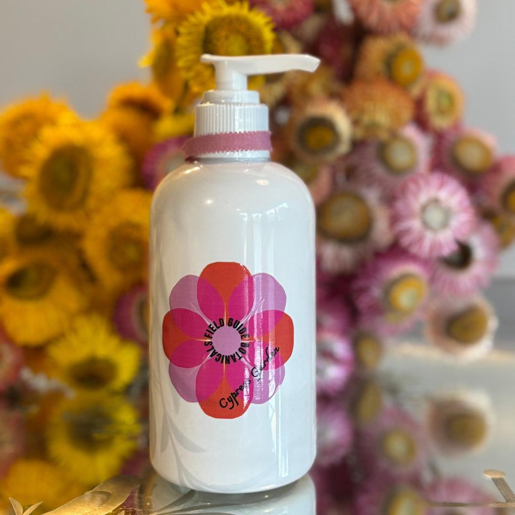 a white 225 ml bottle of Cypress Garden hand and body lotion