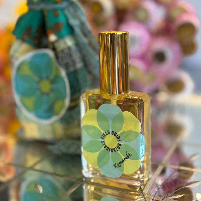 Natural Perfume made with essential oils with a green Flower on label