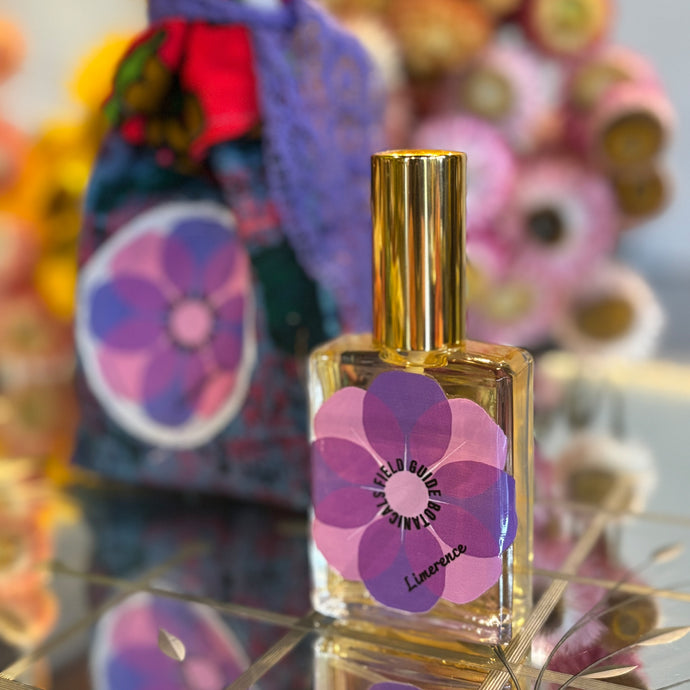 Natural Perfume with a purple flower on label