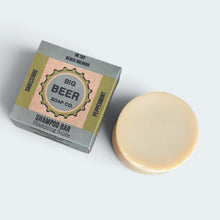 Boxed solid shampoo bar with an unpackaged bar Peppermint